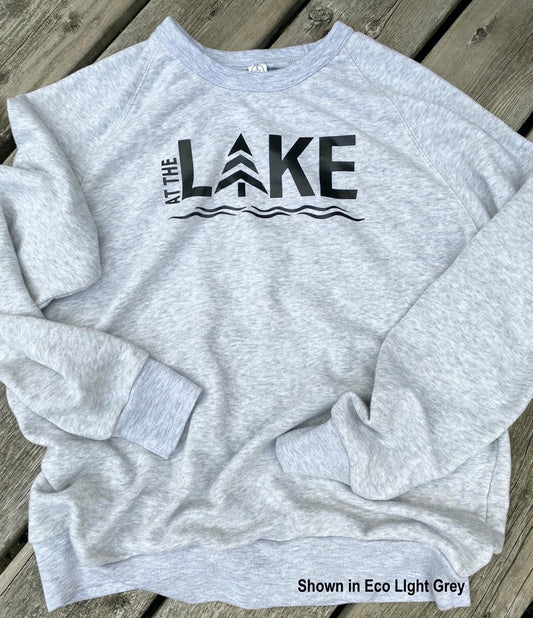 ECO fleece crewneck sweatshirt.  Colour is Light Heather Grey with black HTV logo that says AT THE LAKE