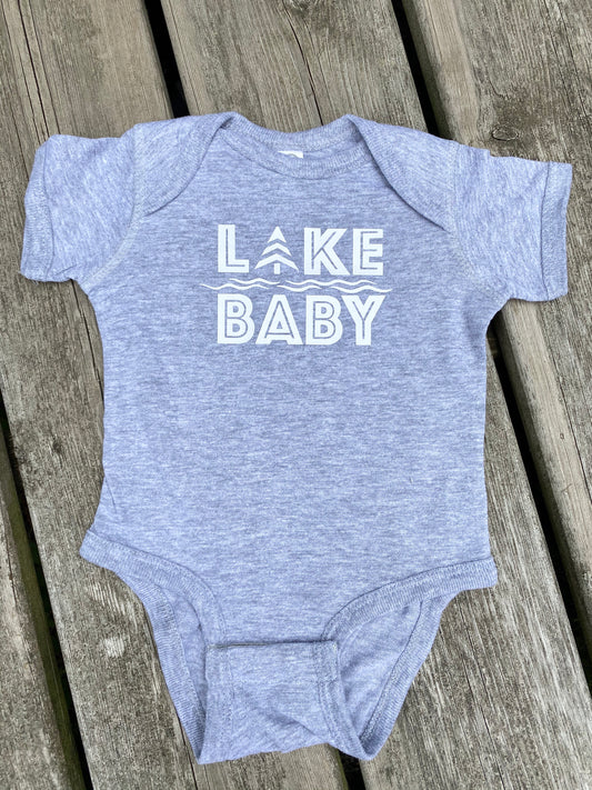 Infant onesie. 90/10 combed ringspun cotton/polyester fine jersey Three-snap closure  Unisex style Heather grey. Shown with white HTV LAKE BABY logo.